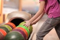 Little girl taking ball in bowling club Royalty Free Stock Photo