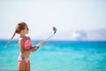 Little girl taking selfie portrait with her smartphone Royalty Free Stock Photo