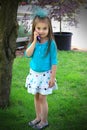 Little girl talking on the cell phone