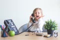 Little girl talking on the phone.