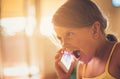 Really? Little girl talking on smart phone. Royalty Free Stock Photo