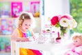 Little girl at tea party Royalty Free Stock Photo