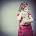 little girl with teddy bear