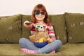 Little girl and teddy bear with 3d glasses