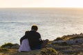 Little girl and teenager boy embraced on sunset Royalty Free Stock Photo