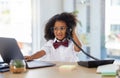 Little girl, telephone and laptop in call center working or playing pretend as a sales consultant at office. Happy kid