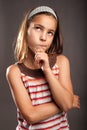 Little girl thinking Royalty Free Stock Photo