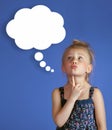 Little girl thinks about the future. Royalty Free Stock Photo