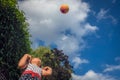 Girl throwing and catching the ball Royalty Free Stock Photo