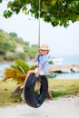 Little girl on tire swing Royalty Free Stock Photo