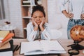 Little Girl Tired. and Think. Mom Help Young Girl. Royalty Free Stock Photo