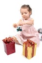 Little girl about to open her Christmas presents Royalty Free Stock Photo
