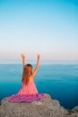 Little girl on top of a mountain enjoying valley view before sunset Royalty Free Stock Photo