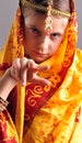 Little girl in traditional Indian clothing and jeweleries