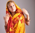 Little girl in traditional Indian clothing and jeweleries