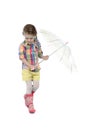 The little girl with an umbrella and in rubber Royalty Free Stock Photo
