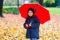 Little girl under umbrella Royalty Free Stock Photo