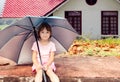 Little girl under umbrella Royalty Free Stock Photo