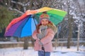 Little girl under umbrella in winter Royalty Free Stock Photo