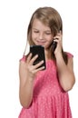 Little Girl Using Cell Phones Royalty Free Stock Photo