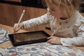 Little girl using ipad