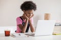 Little girl using laptop at home, child working online on computer indoor, Children lifestyledistance education, studying at home Royalty Free Stock Photo