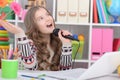 Little girl using modern laptop and singing karaoke Royalty Free Stock Photo