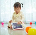 Little girl using tablet Royalty Free Stock Photo