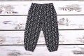 Little girl vintage print trousers. Royalty Free Stock Photo