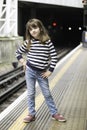 Little girl waiting the train