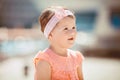 Little girl on walk in the summer outdoors