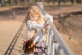 Little girl walking alone in the city park and enjoy. Royalty Free Stock Photo