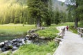 little girl walking along a path near lake nambino Royalty Free Stock Photo