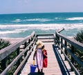 Little Girl Walking on Boardwalk to the Beach Royalty Free Stock Photo