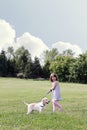 Little Girl Walking her Puppy Royalty Free Stock Photo