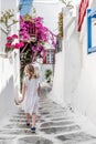 Little girl walking the narrow alley in Greece Royalty Free Stock Photo