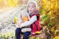 Little girl in warm clothes with toy rabbit Royalty Free Stock Photo