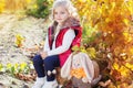 Little girl in warm clothes with toy rabbit Royalty Free Stock Photo