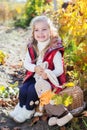 Little girl in warm clothes with toy rabbit Royalty Free Stock Photo