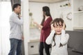 Little girl was crying because dad and mom quarrel, Sad and dramatic scene, Family issued, Children`s Rights abused in Early Royalty Free Stock Photo