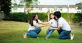 A little girl was slightly injured while playing with her parents comforting her at her side Royalty Free Stock Photo