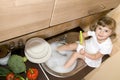 Little girl washing dishes Royalty Free Stock Photo