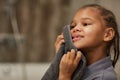 Little Girl Washing Face in Bathroom Royalty Free Stock Photo