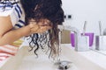 Little girl washing her face in the bathroom Royalty Free Stock Photo