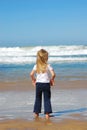 Little girl watching sea Royalty Free Stock Photo