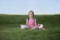 Little girl with watering can in the garden Royalty Free Stock Photo