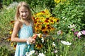 Little girl watering flowers Royalty Free Stock Photo