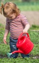 Little girl watering Royalty Free Stock Photo