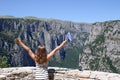 Little girl waves with a Greek flag on Vikos gorge Zagoria Royalty Free Stock Photo