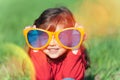Little girl wearing big sunglasses Royalty Free Stock Photo